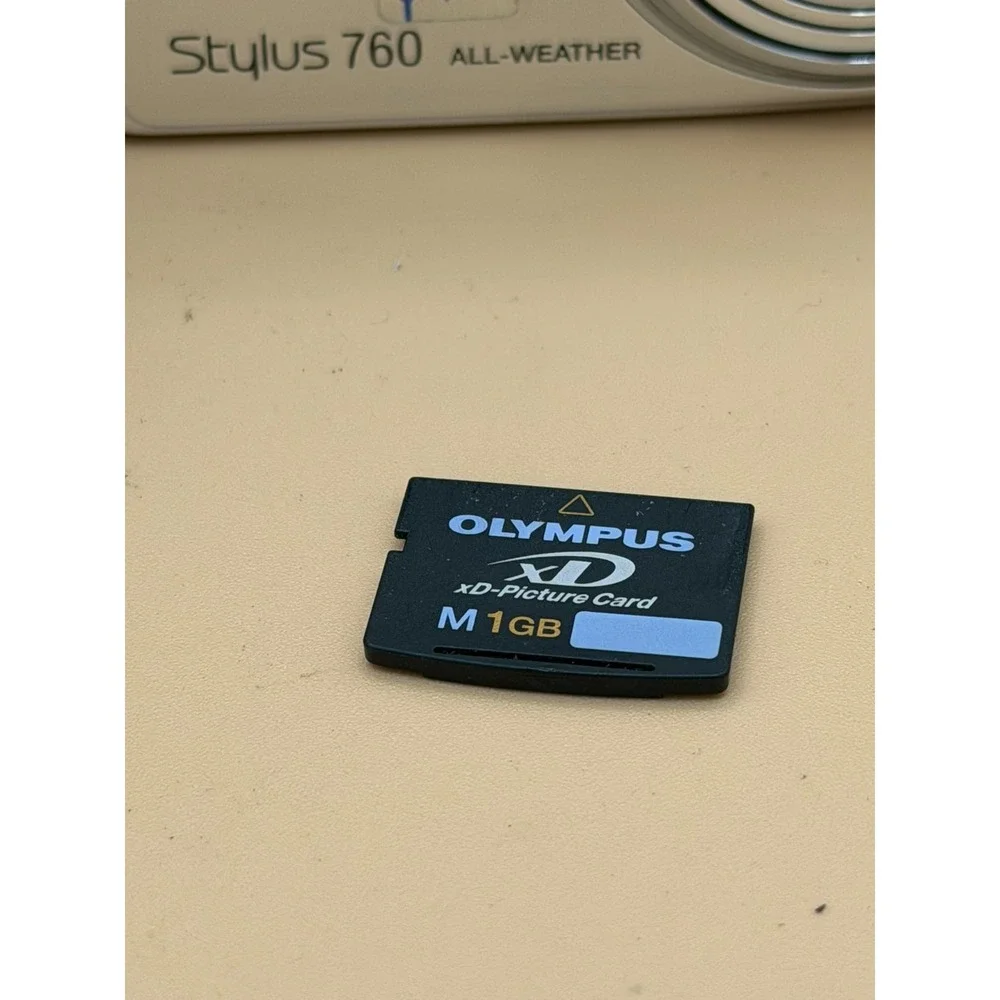 Olympus Stylus 760 7.1MP Digital Camera Silver Tested w/ Charger 1GB xD